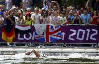 Bulgaria's Petar Stoychev competes in the men's 10km marathon swimming at Hyde Park during the London Olympic Games August 10, 2012.      REUTERS/Dominic Ebenbichler (BRITAIN  - Tags: OLYMPICS SPORT SWIMMING)