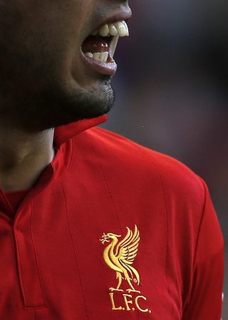 Liverpool's Suarez celebrates his goal against Chelsea during their English Premier League soccer match in Liverpool