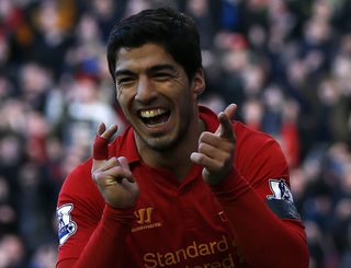 Liverpool's Suarez celebrates his goal against Chelsea during their English Premier League soccer match in Liverpool