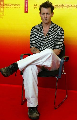 US actor Johnny Depp poses during a photo call at the Venice Lido