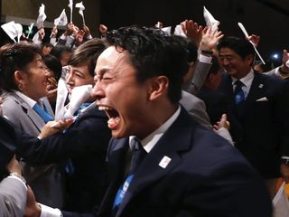 Japanese fencer Yuki Ota cries as Jacques Rogge President of the International Olympic Committee announces Tokyo as the city to host the 2020 Summer Olympic Games during a ceremony in Buenos Aires