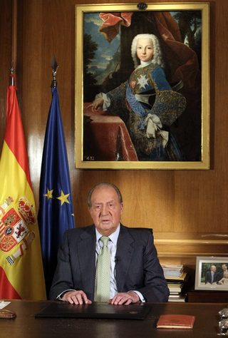 Spain's King Juan Carlos speaks as he delivers his statement at Zarzuela Palace in Madrid