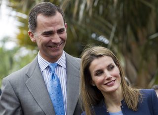 File photo of Spain's Crown Prince Felipe and Princess Letizia smiling at an event in Santa Cruz de Tenerife