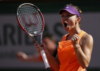 Simona Halep of Romania reacts during her women's singles final match against Maria Sharapova of Russia at the French Open tennis tournament at the Roland Garros stadium in Paris