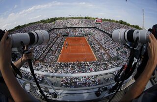 A general view shows the Philippe Chatrier court and spectators during the women's singles final match between Sharapova of Russia and Halep of Romania at the French Open tennis tournament at the Roland Garros stadium in Paris