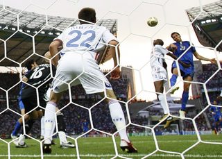 Italy's Marco Materazzi heads to score past France's Fabien Barthez and Franck Ribery during their World Cup 2006 final soccer match in Berlin