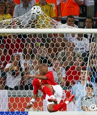 England's Cole fails to prevent a goal from Sweden's Allback during their Group B World Cup 2006 soccer match in Cologne