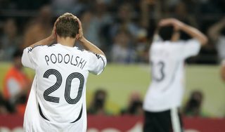 Germany's Podolski reacts to a missed chance during their World Cup 2006 semi-final soccer match against Italy in Dortmund