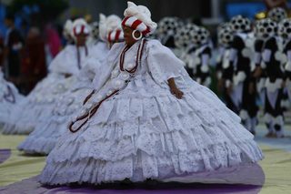 A dancer performs during the opening ceremony of the 2014 World Cup at the Corinthians arena in Sao Paulo