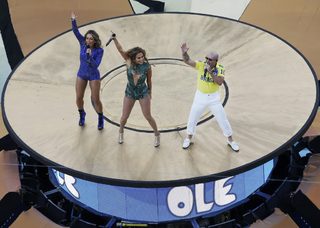 Claudia Leitte, Jennifer Lopez and Pitbull perform during the 2014 World Cup opening ceremony at the Corinthians arena in Sao Paulo