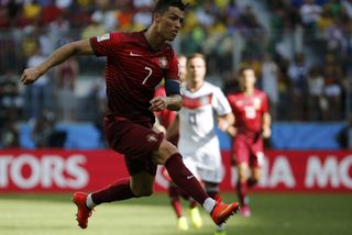 Portugal's Ronaldo kicks the ball during their 2014 World Cup Group G soccer match against Germany at the Fonte Nova arena in Salvador