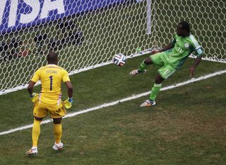 Nigeria's Moses clears a shot by France's Benzema off the goal line during their 2014 World Cup round of 16 game at the Brasilia national stadium in Brasilia