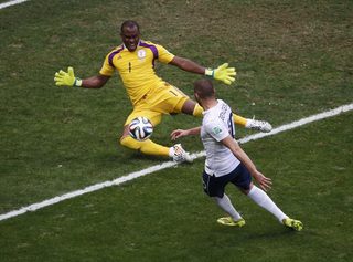 France's Benzema attempts to score against Nigeria's goalkeeper Enyeama during their 2014 World Cup round of 16 game at the Brasilia national stadium in Brasilia;France's Benzema attempts to score against Nigeria's goalkeeper Enyeama during their 2014 World Cup round of 16 game at the Brasilia national stadium in Brasilia