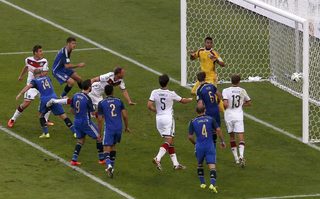 Germany's Hoewedes heads the ball as he tries to score against Argentina during their 2014 World Cup final at the Maracana stadium in Rio de Janeiro