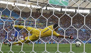 Argentina's goalkeeper Romero makes a save during their 2014 World Cup final against Germany at the Maracana stadium in Rio de Janeiro