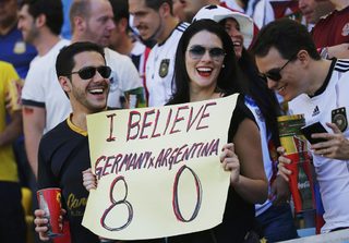 Fans of Germany wait for the start of the 2014 World Cup final between Germany and Argentina at the Maracana stadium in Rio de Janeiro