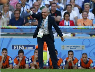 Argentina's coach Sabella gives directions to his players during the 2014 World Cup final between Argentina and Germany at the Maracana stadium in Rio de Janeiro