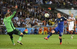 Argentina's Palacio shoots but fails to score a goal past Germany's goalkeeper Neuer during extra time in their 2014 World Cup final at the Maracana stadium in Rio de Janeiro