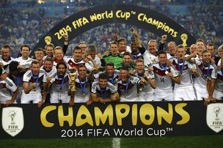 Germany players celebrate with their trophy after winning the 2014 World Cup final between Germany and Argentina at the Maracana stadium
