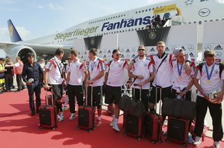 German soccer team stand in front of the plane at Tegel airport in Berlin
