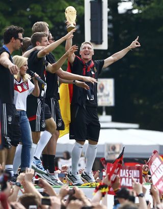 2014-07-15T115320Z_631484644_LR1EA7F0X0MJQ_RTRMADP_3_SOCCER-WORLD-GERMANY.JPG