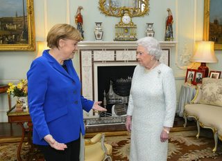 Britain's Queen Elizabeth speaks with German Chancellor Angela Merkel at Buckingham Palace in central London