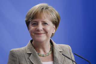 German Chancellor Merkel speaks during news conference after talks with Moldova's Prime Minister Iurie Leanca at the Chancellery in Berlin