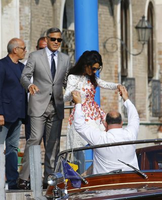 2014-09-28T133233Z_921321735_GM1EA9S1NQ101_RTRMADP_3_PEOPLE-CLOONEY-VENICE.JPG