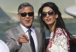 2014-09-28T141852Z_920914229_GM1EA9S1OXU01_RTRMADP_3_PEOPLE-CLOONEY-VENICE.JPG
