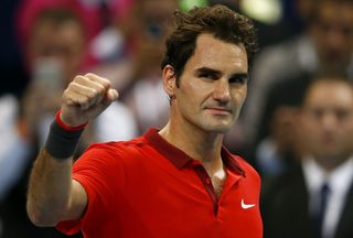 Federer of Switzerland reacts after winning his match against Dimitrov of Bulgaria at the Swiss Indoors ATP tennis tournament in Basel