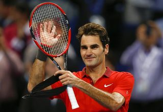 Federer of Switzerland reacts after winning his match against Dimitrov of Bulgaria at the Swiss Indoors ATP tennis tournament in Basel