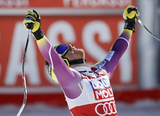Jansrud of Norway reacts in the arrival area in the men's downhill race at the Alpine Skiing World Cup Finals in Meribel
