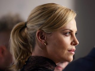 Cast member Charlize Theron attends a news conference for the film "Mad Max: Fury Road" out of competition at the 68th Cannes Film Festival in Cannes
