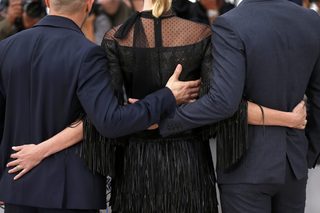 Cast members Tom Hardy, Charlize Theron and director George Miller pose during a photocall for the film "Mad Max: Fury Road" out of competition at the 68th Cannes Film Festival in Cannes