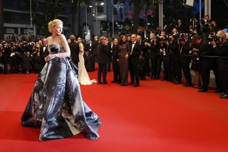 Cast member Cate Blanchett poses on the red carpet as she leaves after the screening of the film "Carol" in competition at the 68th Cannes Film Festival in Cannes