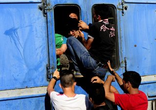 2015-07-19T175256Z_154125026_GF10000164227_RTRMADP_3_MACEDONIA-MIGRANTS.JPG