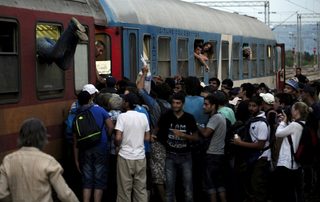 2015-07-19T191837Z_1185703808_GF10000164314_RTRMADP_3_MACEDONIA-MIGRANTS.JPG
