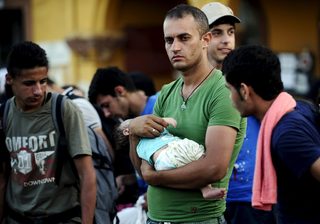 2015-07-19T192250Z_1282736394_GF10000164315_RTRMADP_3_MACEDONIA-MIGRANTS.JPG
