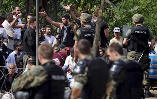 2015-08-21T095552Z_1356912202_GF10000178211_RTRMADP_3_EUROPE-MIGRANTS-MACEDONIA.JPG