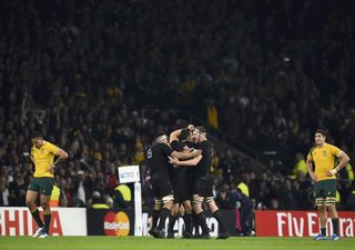 New Zealand players celebrate after beating Australia to win the Rugby World Cup final match at Twickenham in London