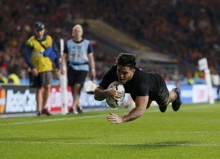 Nehe Milner-Skudder of New Zealand scores try during their Rugby World Cup final match against Australia at Twickenham in London