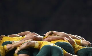 Australia players compete in a scrum with New Zealand players during their Rugby World Cup final match at Twickenham in London