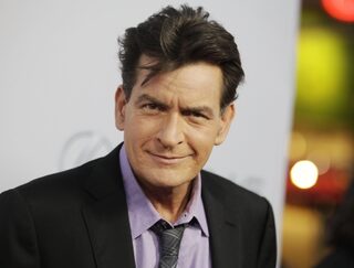 Cast member Sheen poses at the premiere of "Scary Movie 5" in Hollywood