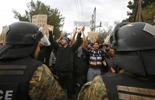2015-11-22T115908Z_1111545494_LR1EBBM0XA91W_RTRMADP_3_EUROPE-MIGRANTS-BALKANS.JPG