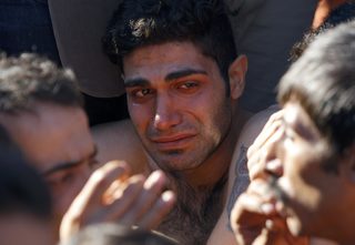 2015-11-23T101805Z_104561739_LR1EBBN0SLUS0_RTRMADP_3_EUROPE-MIGRANTS-BALKANS.JPG