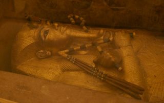 The golden sarcophagus of King Tutankhamun in his burial chamber is seen in the Valley of the Kings, in Luxor