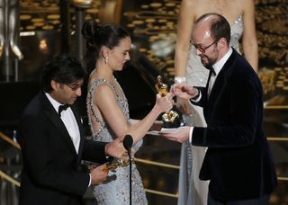2016-02-29T035353Z_1686360112_TB3EC2T0ATIR2_RTRMADP_3_AWARDS-OSCARS.JPG