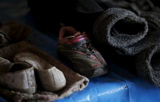 2016-03-04T110442Z_457918443_GF10000331947_RTRMADP_3_JAPAN-DISASTER-SEARCH.JPG