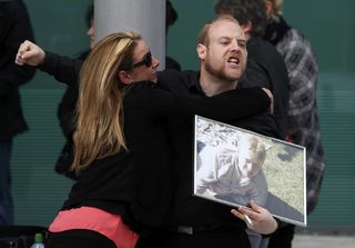 Relatives react after the jury delivered its verdict at the new inquests into the Hillsborough disaster, in Warrington, Britain