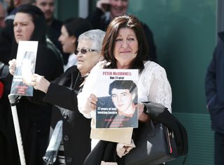 Relatives react after the jury delivered its verdict at the new inquests into the Hillsborough disaster, in Warrington, Britain